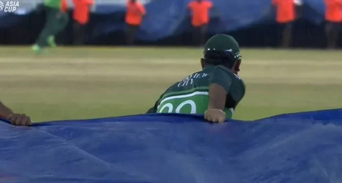 Rain postpones India-Pakistan's match at the 2023 Asia Cup, and Fakhar Zaman assists ground staff in putting up coverings.