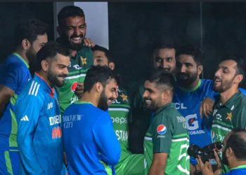 Players from India and Pakistan have some laughs in the pavilion after the washout during the Asia Cup in 2023.