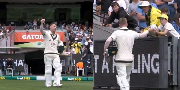 David Warner says goodbye to MCG and gives a young fan in the stands gloves during Australia vs. Pakistan.