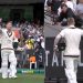 David Warner says goodbye to MCG and gives a young fan in the stands gloves during Australia vs. Pakistan.