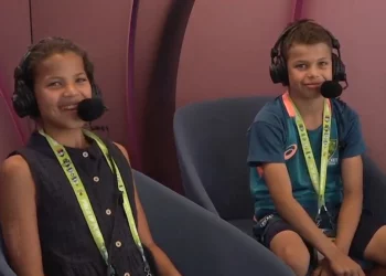 Andrew Symonds' children adorn the SCG commentary box.