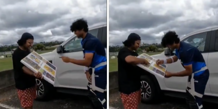 Rachin Ravindra autographs a poster for a New Zealand CSK supporter.