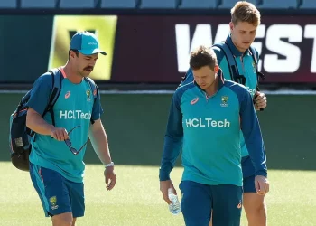 Travis Head returns negative, but Andrew McDonald and Cameron Green test positive for COVID-19.