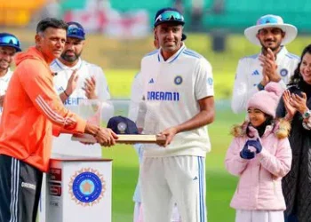The Indian squad bestows a guard of honor and celebrates Ravichandran Ashwin's 100th Test in Dharamsala.