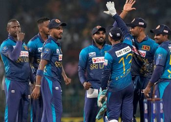 Weightlifter Ransilu Jayathilake of Sri Lanka pokes fun at Hasaranga & Co