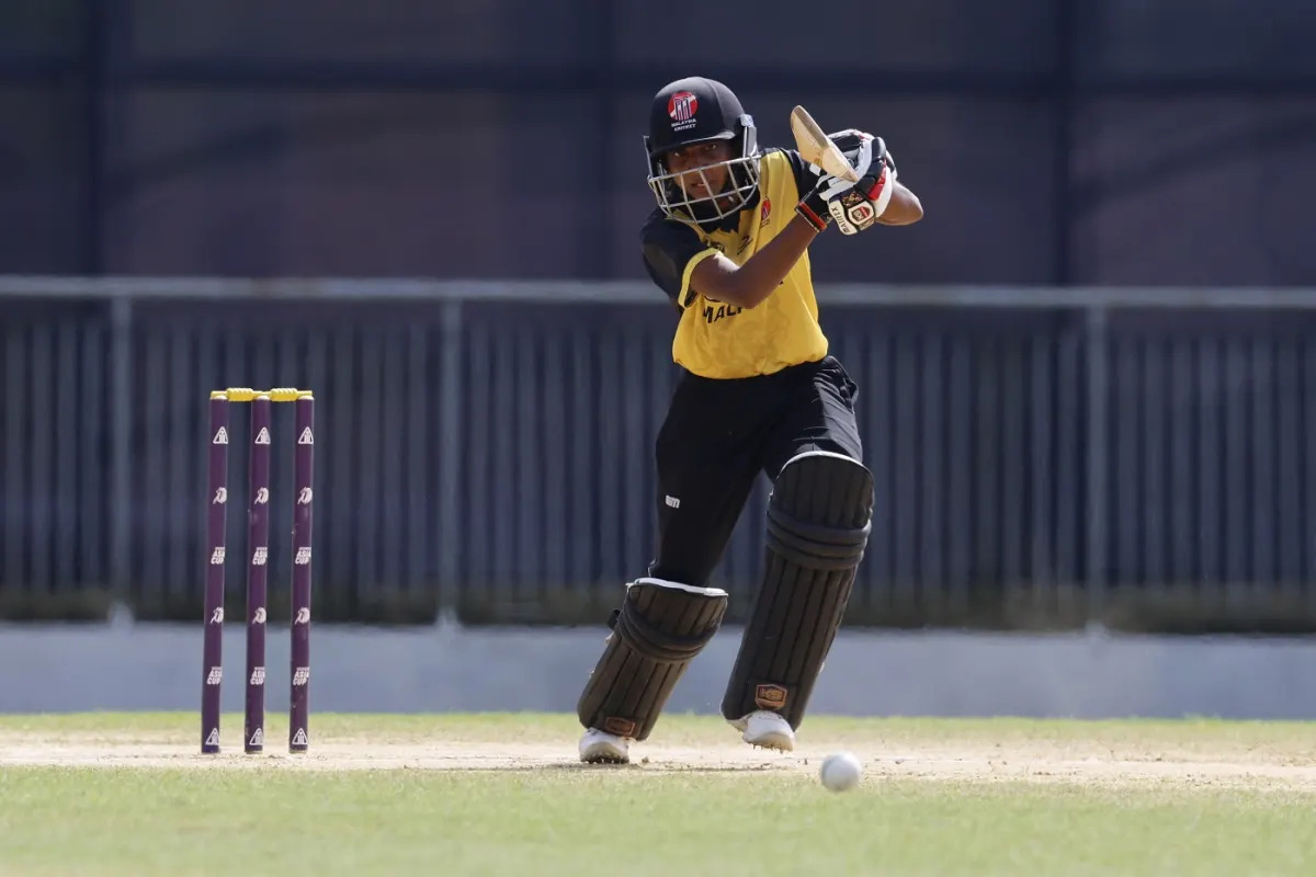 Wan Julia's maiden half-century went in vain