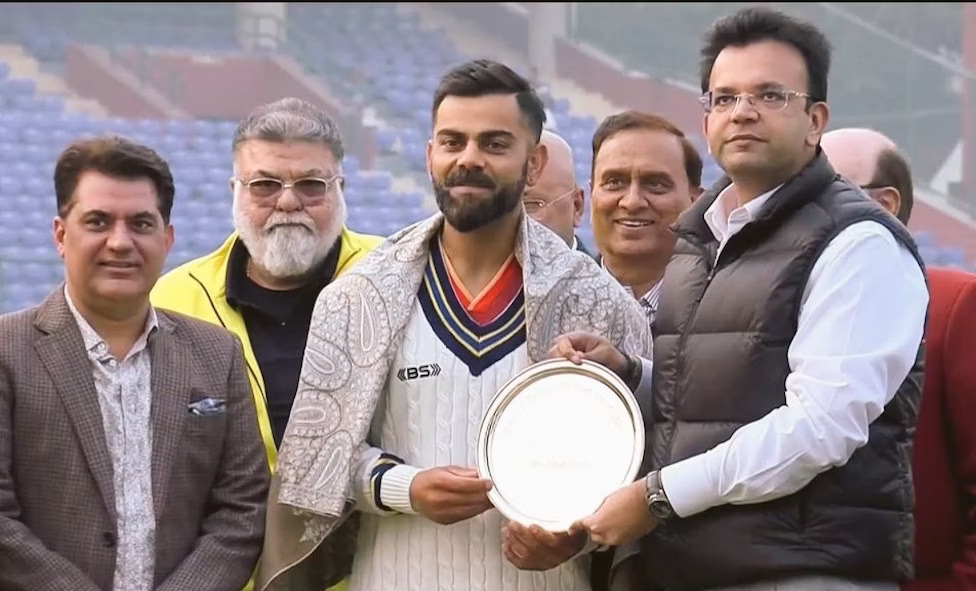 Why was Virat Kohli honoured by DDCA in Ranji Trophy match?